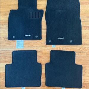 New genuine OEM Mazda 3 carpet floor mats set. Will fit 2019-2024 year Mazda 3s